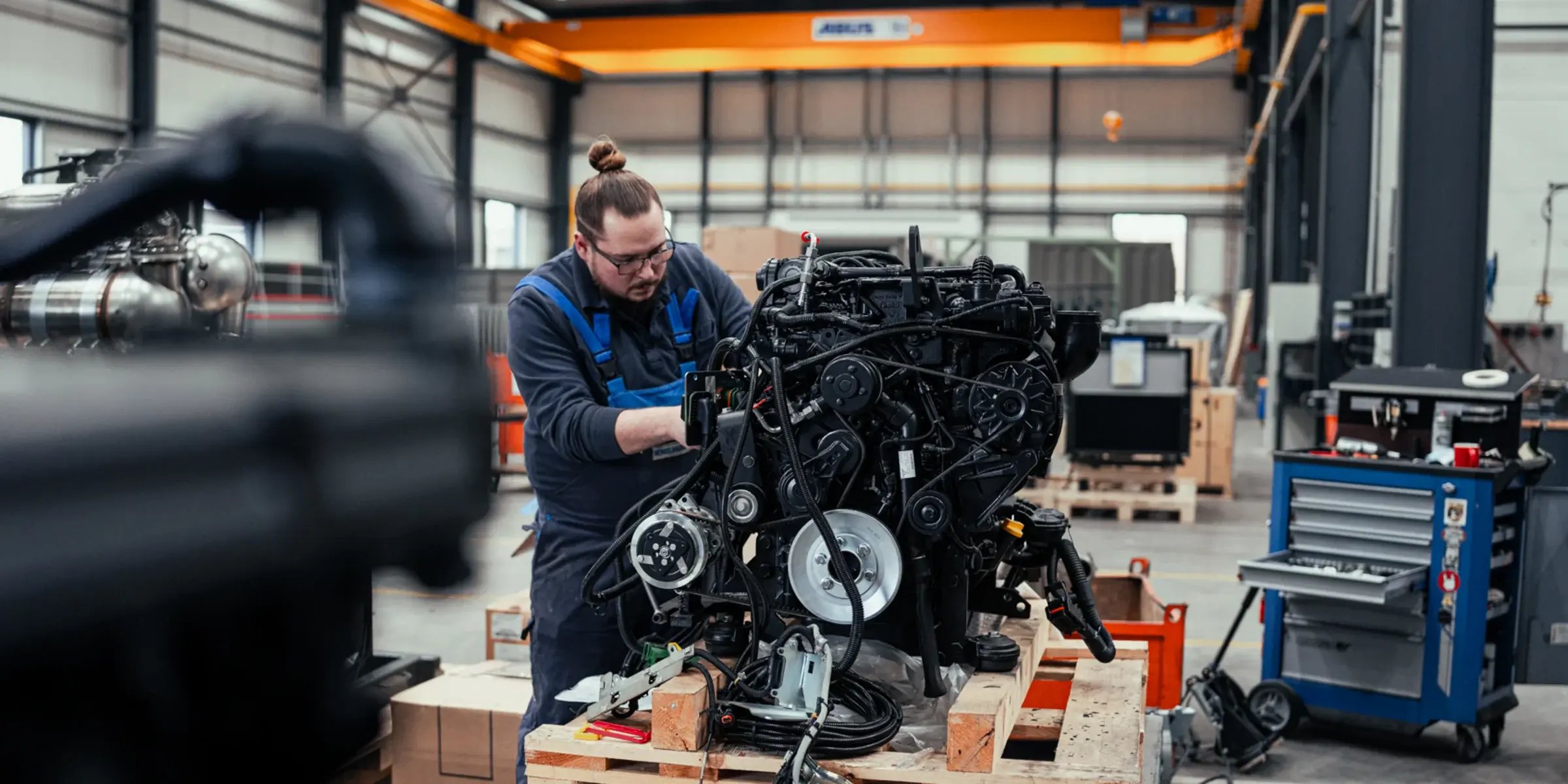 Worker working with a motor
