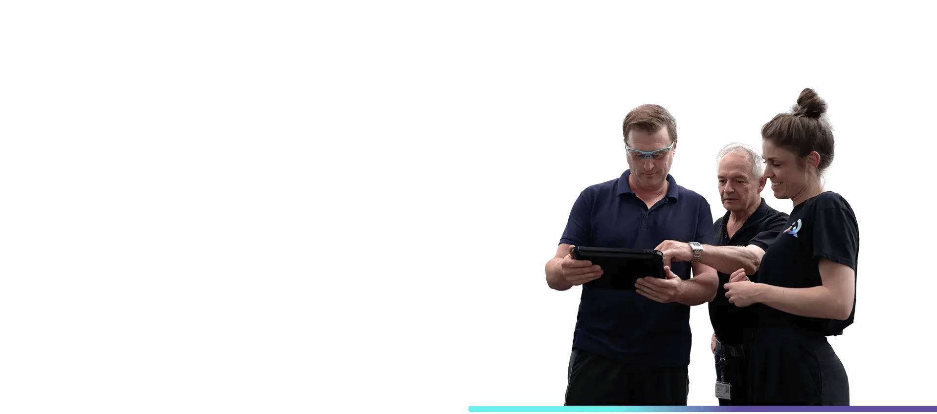 Three people looking at a tablet together; the woman wears a findIQ shirt