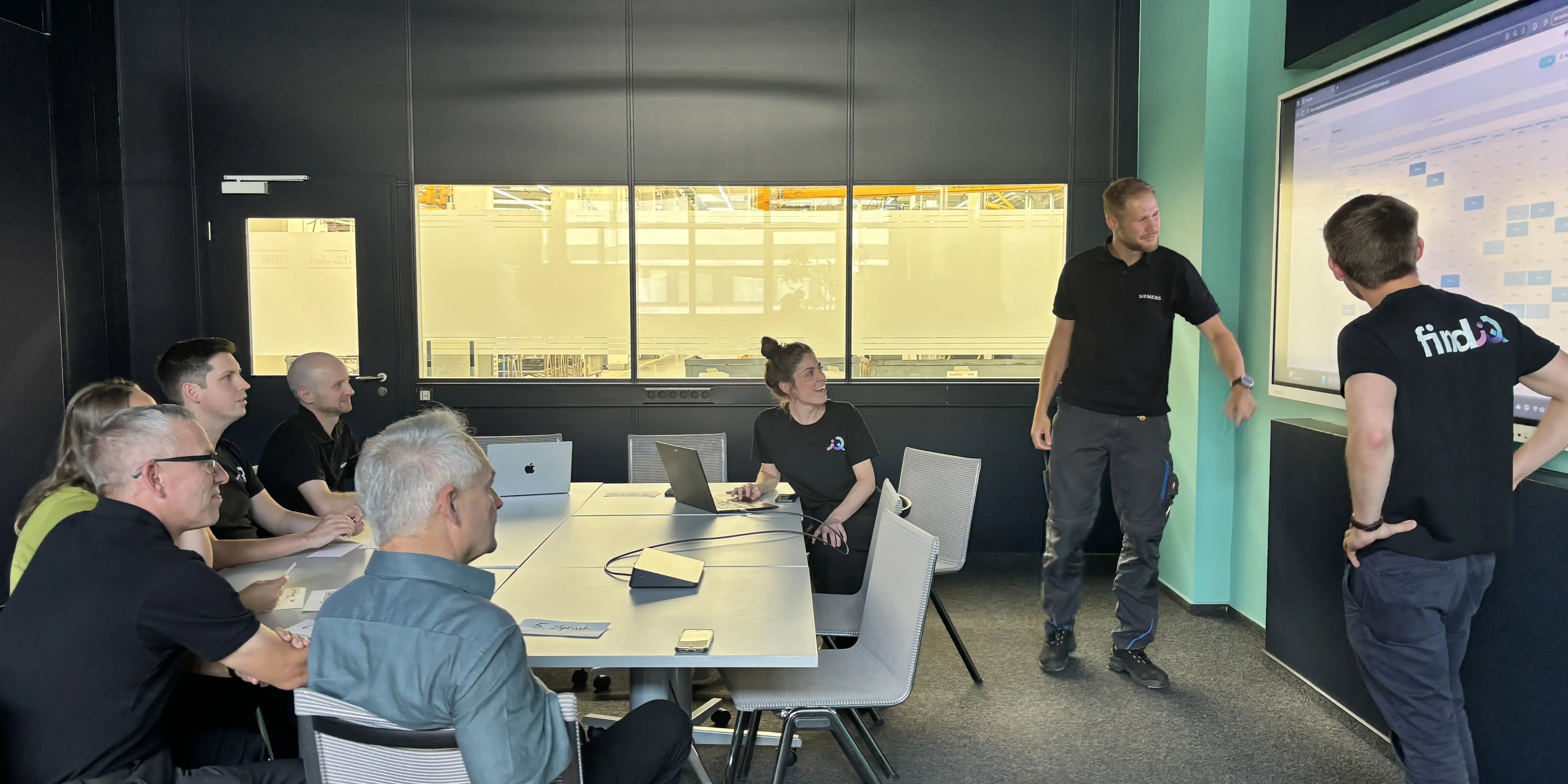 Coference room during a meeting with Siemens and findIQ